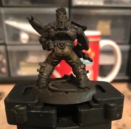 miniatures in brown leather