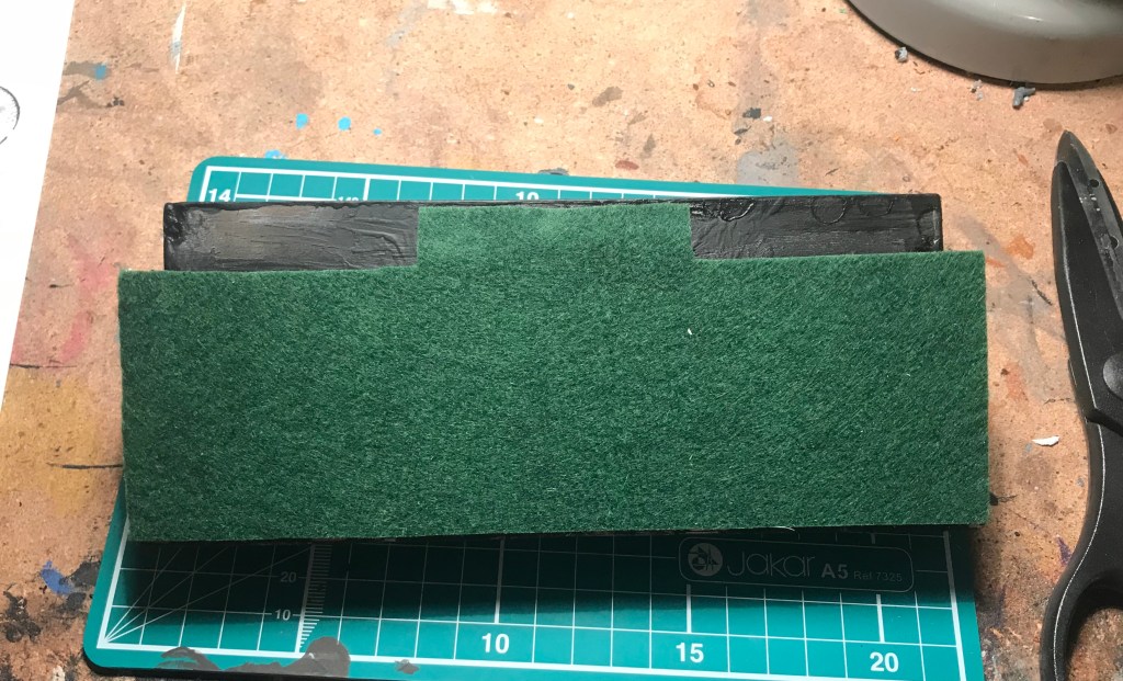 base padding on miniature display plinth