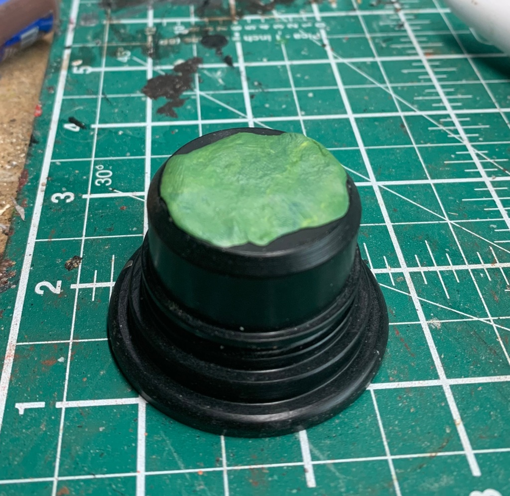 green stuff on plinth