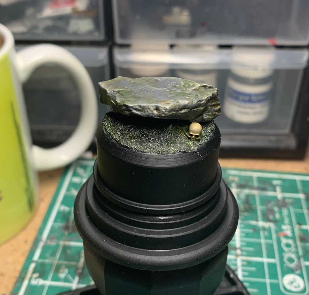 painting moss onto a miniature base